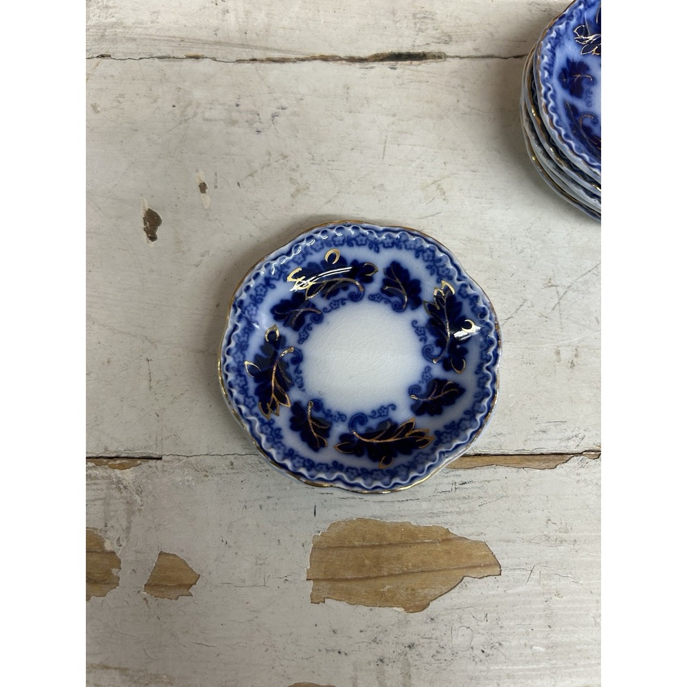Set of Six (6) Butter Pats - Flow Blue Normandy by Johnson Bros w/gold trim